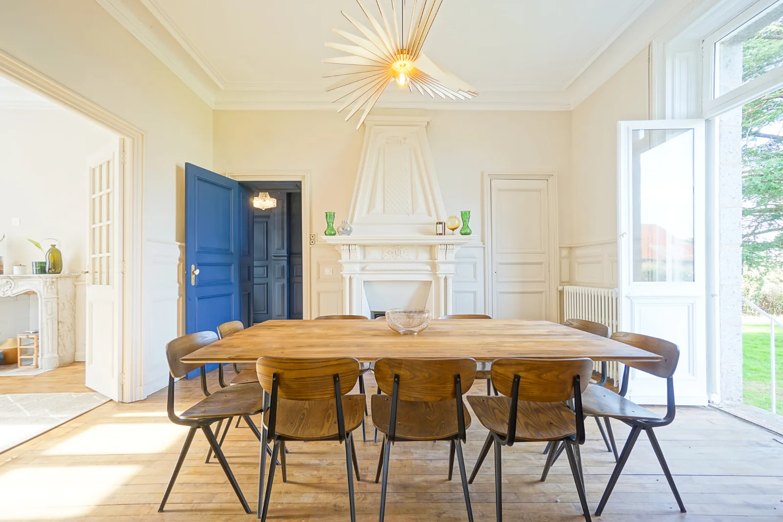 Large dining table at Le Manoir Ducey, extendable to seat sixteen